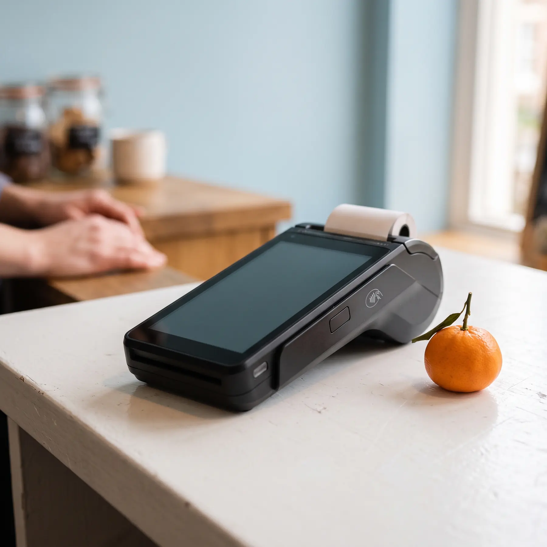 Countertop Android payment terminal on a white counter